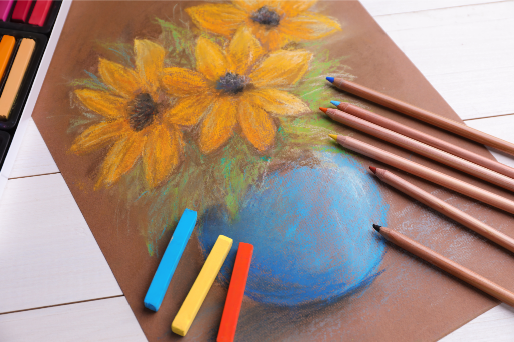 a pastel chalk drawing of a vase of yellow flowers